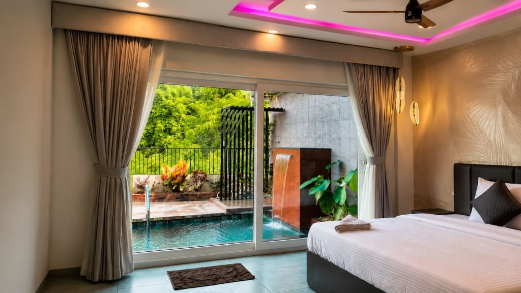 Premium pool suite with ambient lighting and private plunge pool